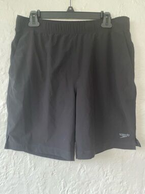 Speedo black men’s performance swim shorts, pockets; size M